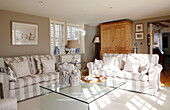 Transparent coffee table in living room of Hampshire home England UK