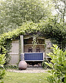 Overgrown summerhouse in Abbekerk Dutch province of North Holland in the municipality of Medemblik