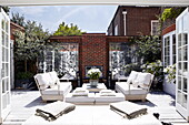 Brick exterior in luxury courtyard garden of London home UK