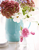 Cut flowers in turquoise jug, Oxfordshire cottage, England, UK