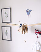 Mobile cow and artwork in childs room, Oxfordshire, England, UK
