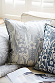 Blue floral cushions in textile designers Birmingham home England UK