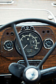 Steering wheel and dashboard of a Vintage Bedford panoramic bus also know asThe Majestic bus near Hay-on-Wye, Wales, UK