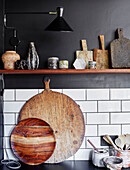 Rustic kitchenware and wooden chopping boards in Ramsgate home Kent, UK