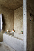 Concrete bath with towel in Sligo home, Ireland