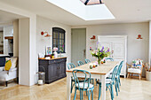 Upcycled furniture and parquet floor in Oxfordshire dining room extension, UK