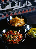 Selection of Moroccan vegetable dishes with chermoula