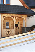 Woodworked porch on Polish mountain chalet
