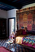 Bedroom, decorated with ornate oriental textiles