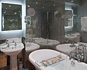 Mirror mosaic bathroom in apartment in St Leonards on Sea, East Sussex, UK
