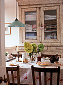 Country style kitchen with laid table