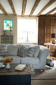 White sofa in wood beamed Hastings living room