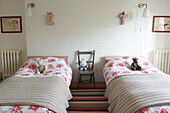Twin beds in childs room of Canterbury home England UK