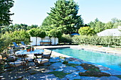 Poolside seating of Massachusetts home, New England, USA