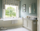 Pastel blue bathroom in Lincolnshire country house, England, UK