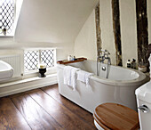 Freestanding bath in timber framed country house conversion Suffolk, England, UK