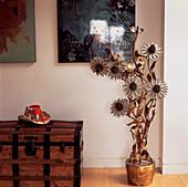 Display of artwork and furniture in a hallway
