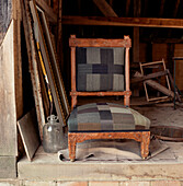 Unwanted vintage furniture and home wares stored in a garden shed