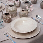 Detail of table setting with neutral tableware