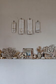 Collection of objets trouves on mantlepiece in Hove kitchen East Sussex England UK