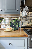 Kitchenware and mirrored splashback in Gloucestershire kitchen UK