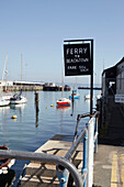 Ferry sign in Weymouth harbour, Dorset, UK