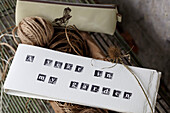Garden string and labels with pencil case in St Lawrence, Isle of Wight, UK