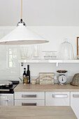 Pendant lamp in contemporary kitchen of Isle of Wight home, UK