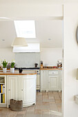 Skylight in cream tiled kitchen of Kent home, England, UK