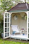 Deck chair in summerhouse, Bembridge, Isle of Wight, UK