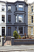 Grey three-storey townhouse in Hastings East Sussex England UK