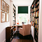 Small study with built in bookshelves and desk by the window