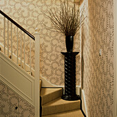 Wallpapered hall with staircase