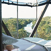 Bedroom with view of river