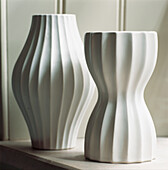 Two contemporary white ceramic vases