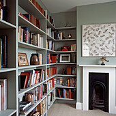 Study with racks of open shelving and storage space for books