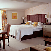 Guest bedroom with king size double bed with suede padded headboard
