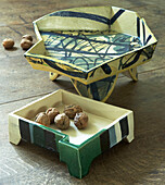 Designer ceramic vessels with walnuts