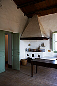 Simple kitchen interior with traditional fireplace