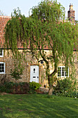 The 18th century cottage exterior and garden