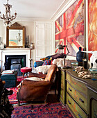 Brown leather armchair and Union Jack in living room of Evershot home, Dorset, Kent, UK