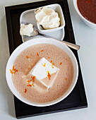 Dark hot chocolate with orange zest and marshmallow