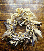 Wreath of dried plants and found objects