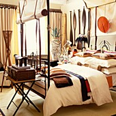 Four poster bed and a collection of African artifacts