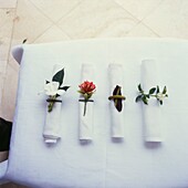 Napkins with single stem flower decoration