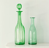 Green glass decanter and vase