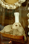 A stuffed lamb in a restaurant windowin Segovia 