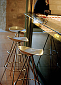 Modern designer bar stool at counter in Tapas bar