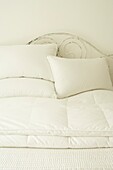 Crisp white bedding on a bed
