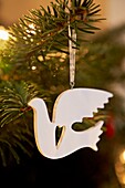 Dove Christmas tree ornament hanging in London home   UK